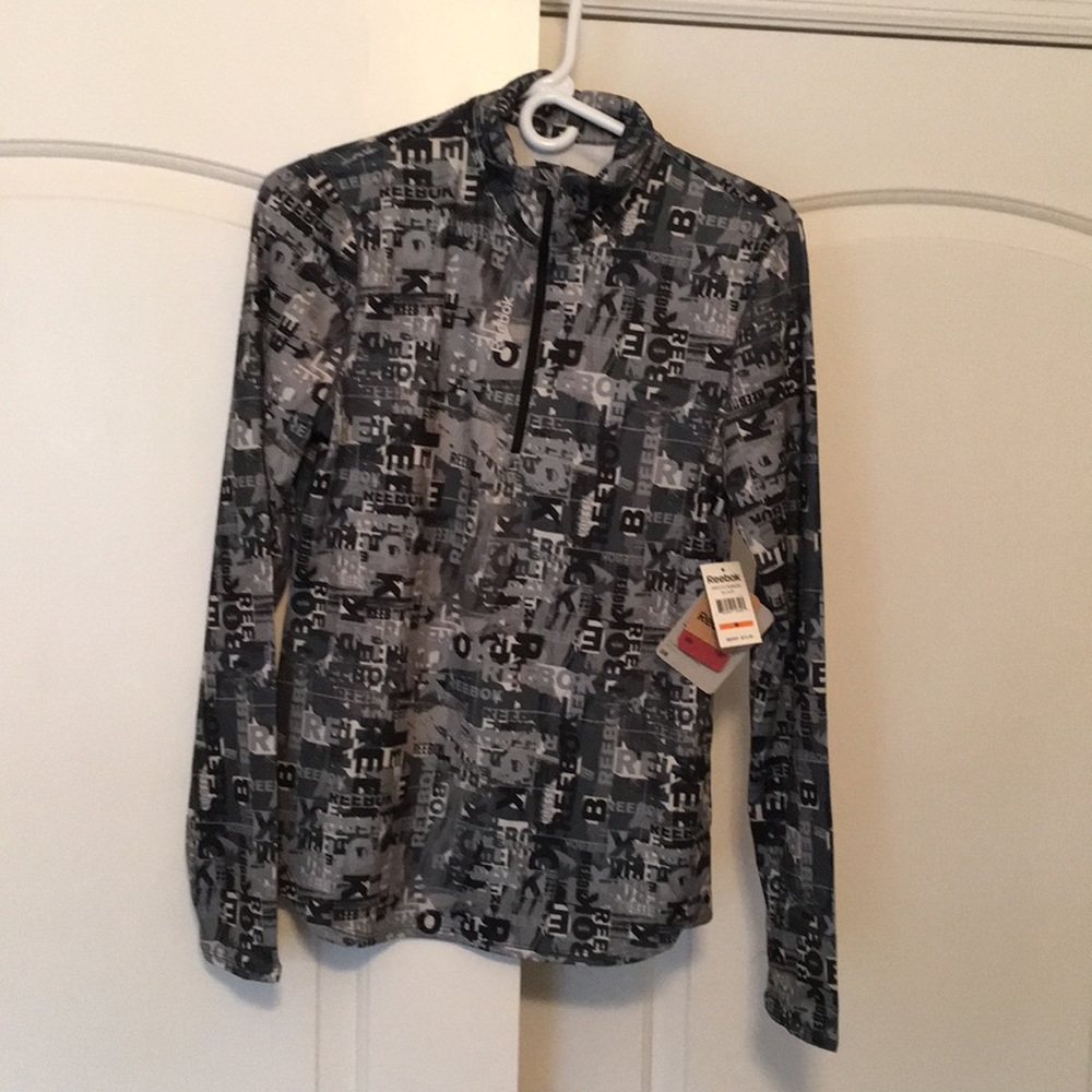 Women’s Med Reebok running/cycling shirt